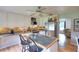 Bright kitchen featuring an island with bar seating, stainless steel appliances, and a view into the living space at 1809 Brandi Ln, Loganville, GA 30052