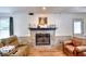 Inviting living room with a stone fireplace and cozy leather recliners at 1809 Brandi Ln, Loganville, GA 30052