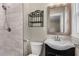 Bathroom with white subway tile shower, decorative mirror, and vanity at 2288 Scotty Cir, Decatur, GA 30032