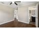 Bedroom featuring hardwood floors and access to a bathroom and laundry area at 2288 Scotty Cir, Decatur, GA 30032