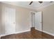 Neutral bedroom featuring hardwood floors and a ceiling fan at 2288 Scotty Cir, Decatur, GA 30032