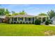 Charming single-story home featuring a well-manicured lawn and classic architecture at 2288 Scotty Cir, Decatur, GA 30032
