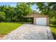 Detached garage with ample parking space and an attached carport at 2288 Scotty Cir, Decatur, GA 30032