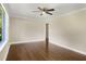 Living room featuring hardwood floors, neutral walls, and ample natural light at 2288 Scotty Cir, Decatur, GA 30032
