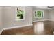 Living room with hardwood floors, neutral walls and large windows at 2288 Scotty Cir, Decatur, GA 30032