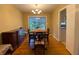 Inviting dining room with hardwood floors and traditional chandelier lighting at 3098 Henderson Mill Rd, Atlanta, GA 30341