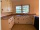 Functional kitchen with ample countertop space and classic white cabinetry at 3098 Henderson Mill Rd, Atlanta, GA 30341