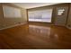 Bright living room featuring gleaming hardwood floors and lots of natural light at 3098 Henderson Mill Rd, Atlanta, GA 30341