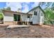 Expansive backyard features a patio and lush green space perfect for outdoor entertaining at 4398 Stonebridge Ct, Duluth, GA 30096