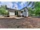 Expansive backyard features a patio and lush green space perfect for outdoor entertaining at 4398 Stonebridge Ct, Duluth, GA 30096