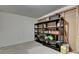 Unfinished basement area with installed metal storage shelving at 4398 Stonebridge Ct, Duluth, GA 30096