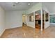 Open living space with hardwood floors, a stone fireplace, and a well-lit, airy atmosphere at 4398 Stonebridge Ct, Duluth, GA 30096