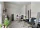 Functional home office with two desks, comfortable chairs, and plenty of natural light at 7207 Gladstone Cir, Stonecrest, GA 30038