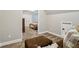 This living room features a comfortable couch and doorway to another bedroom at 1006 Amberton Ln, Powder Springs, GA 30127