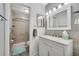 Renovated bathroom with modern vanity, shower, and stylish fixtures at 3428 Ivys Walk, Atlanta, GA 30340