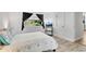 Bedroom includes a TV with a nature view through the window and light-colored floors at 3428 Ivys Walk, Atlanta, GA 30340