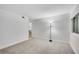 Bright bedroom with ample natural light and modern carpet flooring at 3428 Ivys Walk, Atlanta, GA 30340