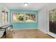 A bright bedroom with hardwood flooring and large windows at 3428 Ivys Walk, Atlanta, GA 30340