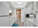 Eat-in kitchen with updated appliances and countertops, plus washer and dryer area at 3428 Ivys Walk, Atlanta, GA 30340