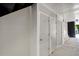 Exterior storage units with a row of white doors and siding at 3428 Ivys Walk, Atlanta, GA 30340