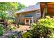 Stunning backyard with a serene pond and deck, perfect for outdoor relaxation and entertaining at 570 Hunt River Way, Suwanee, GA 30024