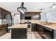 Modern kitchen with stainless steel appliances, granite countertops, and a functional center island at 570 Hunt River Way, Suwanee, GA 30024