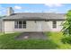 View of back of house and well kept backyard at 2806 Vintage Wood Nw Way, Kennesaw, GA 30144