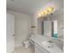 Bathroom features vanity, a large mirror, and tile flooring at 2806 Vintage Wood Nw Way, Kennesaw, GA 30144