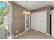 Breakfast nook featuring a glass door with backyard view, a window, and a large closet for storage at 2806 Vintage Wood Nw Way, Kennesaw, GA 30144