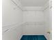 Walk-in closet with white wire shelving offers ample storage at 2806 Vintage Wood Nw Way, Kennesaw, GA 30144