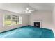Comfortable living room with a fireplace and large windows at 2806 Vintage Wood Nw Way, Kennesaw, GA 30144