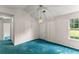 Bright living room features vaulted ceiling, light fixture, and a window at 2806 Vintage Wood Nw Way, Kennesaw, GA 30144