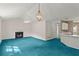 Spacious living room featuring a fireplace and view to kitchen at 2806 Vintage Wood Nw Way, Kennesaw, GA 30144