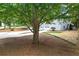 Side of the home with ground-level garage and stairs at 3009 Gant Quarters Dr, Marietta, GA 30068