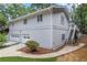 Rear of the house showing the garage and stairs leading up to the main house at 3009 Gant Quarters Dr, Marietta, GA 30068