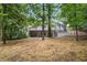 Exterior of the home showing the backyard, deck and lush greenery around the property at 3009 Gant Quarters Dr, Marietta, GA 30068