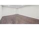 Spacious basement area featuring laminate flooring, bright lighting, and fresh paint for a modern feel at 3009 Gant Quarters Dr, Marietta, GA 30068