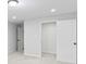 Finished basement area with gray carpet, neutral walls and white doors at 3009 Gant Quarters Dr, Marietta, GA 30068