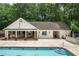 The community clubhouse has an outdoor seating area and a fireplace for entertaining at 3009 Gant Quarters Dr, Marietta, GA 30068