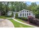 Beautifully landscaped front yard with manicured hedges and a concrete driveway leading to a lovely one-story home at 3009 Gant Quarters Dr, Marietta, GA 30068