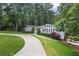 Well-maintained lawn and landscaped front yard complement this charming one-story home at 3009 Gant Quarters Dr, Marietta, GA 30068