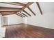 Large living room with wood flooring, exposed beams, and recessed lighting at 3009 Gant Quarters Dr, Marietta, GA 30068