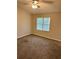Bedroom featuring neutral walls, ceiling fan, and a window at 354 Dublin Way, Lawrenceville, GA 30044