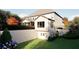 Spacious backyard with a full finished basement entrance, featuring mature trees and landscaping at 3680 Tanglewood Se Dr, Atlanta, GA 30339