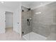 Modern bathroom featuring a glass-enclosed shower with sleek tile and fixtures at 586 Avondale Park Cir, Decatur, GA 30032