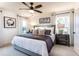 Stylish bedroom featuring a comfortable bed, elegant decor, and abundant natural light for a serene retreat at 586 Avondale Park Cir, Decatur, GA 30032
