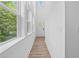 Entryway featuring wood floors, high ceilings, and white walls at 586 Avondale Park Cir, Decatur, GA 30032