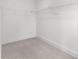 Spacious walk-in closet with white wire shelving at 586 Avondale Park Cir, Decatur, GA 30032