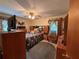 Bedroom with a bed, furniture, ceiling fan, and a rocking chair at 1046 Waterside Se Dr, Conyers, GA 30013