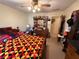 Spacious bedroom with carpet floors, a large dresser, and ample natural light at 1046 Waterside Se Dr, Conyers, GA 30013